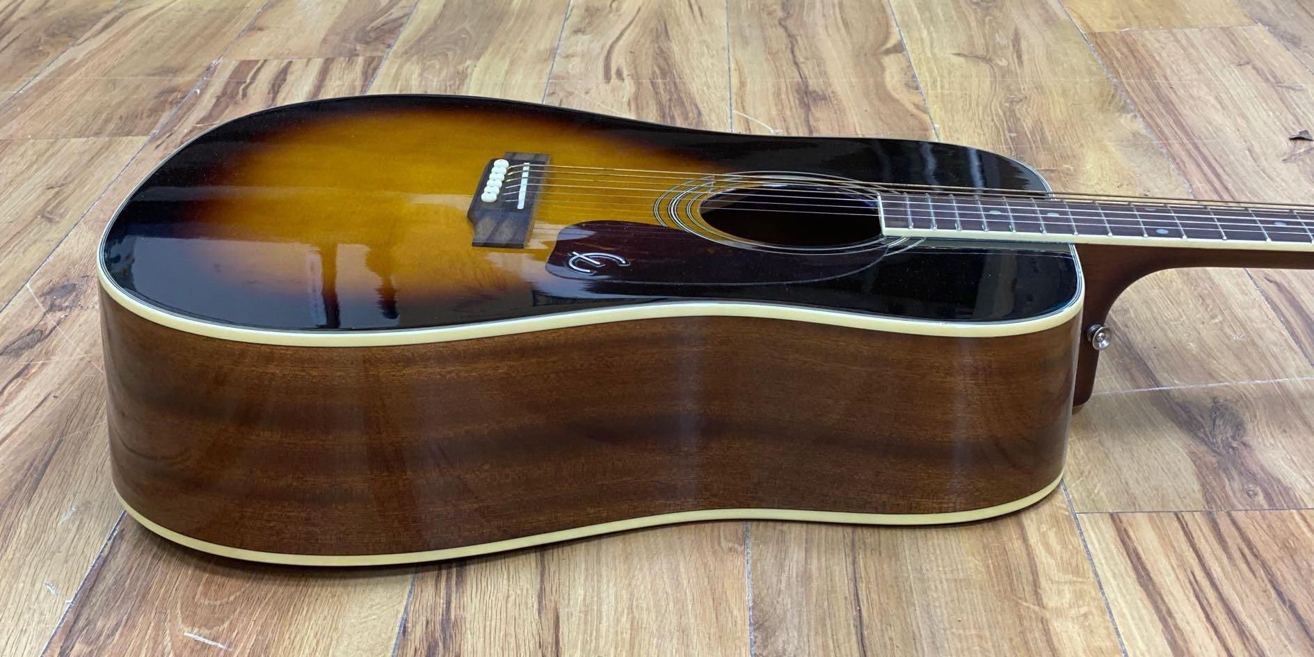 An Epiphone acoustic guitar, model DR-220SVS, in soft case